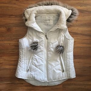 Maurice white puffer vest with fur hood.